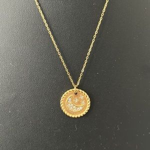 Adorina NWOT Water Resistant celestial disc pendant